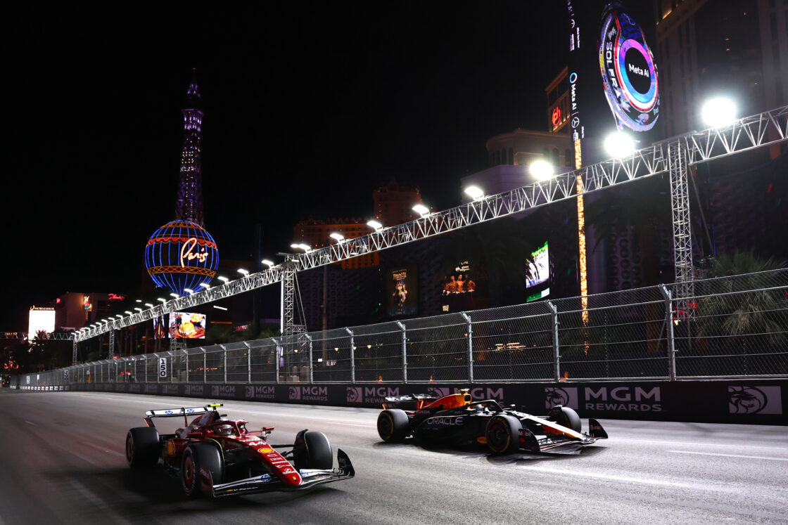 Yuki Tsunoda of Japan driving the (22) Oracle Red Bull Racing RB21 and Lewis Hamilton of Great Britain driving the (44) Scuderia Ferrari SF-25 battle for track position during the F1 Grand Prix of Las Vegas at Las Vegas Strip Circuit on November 22, 2025 in Las Vegas, Nevada. (Photo by Clive Rose/Getty Images